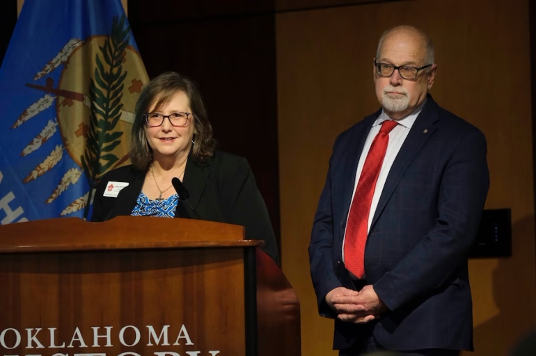 Laura Schuler, senior director for Catholic education at the Archdiocese of Oklahoma City, and Michael Scaperlanda, chancellor for the archdiocese, present a proposal for the nation's first publicly funded Catholic charter school on Feb. 14. (Doug Hoke/The Oklahoman / Usa Today Network)