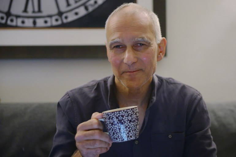 Moungi Bawendi, a professor at the Massachusetts Institute of Technology (MIT), drinks coffee at home after winning the 2023 Nobel Prize in Chemistry, in Cambridge, Massachusetts, U.S., October 4, 2023. REUTERS/Brian Snyder REFILE - QUALITY REPEAT