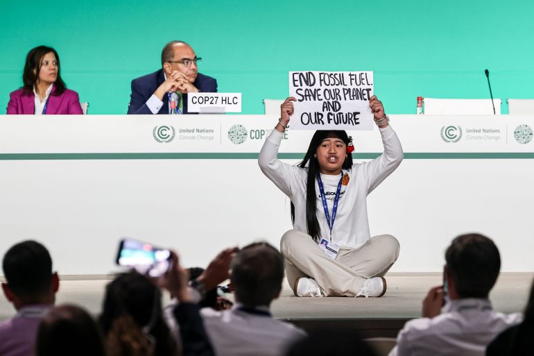 A young activist of American indigenous origins, Licypnya Kangujam force herself onto the stage in a protest against fossil fuels extraction during the Global Climate Action. Uniting on the Pathway to 2030 and Beyond session in plenary room during the COP28, UN Climate Change Conference, held by UNFCCC in Dubai Exhibition Center, United Arab Emirates on December 11, 2023. COP28, running from November 30 to December 12 focuses on national climate goals. The Conference in Dubai focuses also on the most vulnerable communities and Loss and Damage Fund.