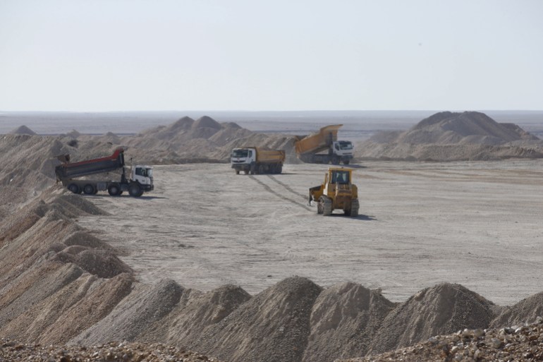 A vehicle carries untreated phosphate after being dropped off on a mountain at a phosphate mine at Boucraa factory of the National Moroccan phosphate company (OCP) situated in the southern provinces, 100 km southwest of the town of Laayoune, February 18, 2016. REUTERS/Youssef Boudlal