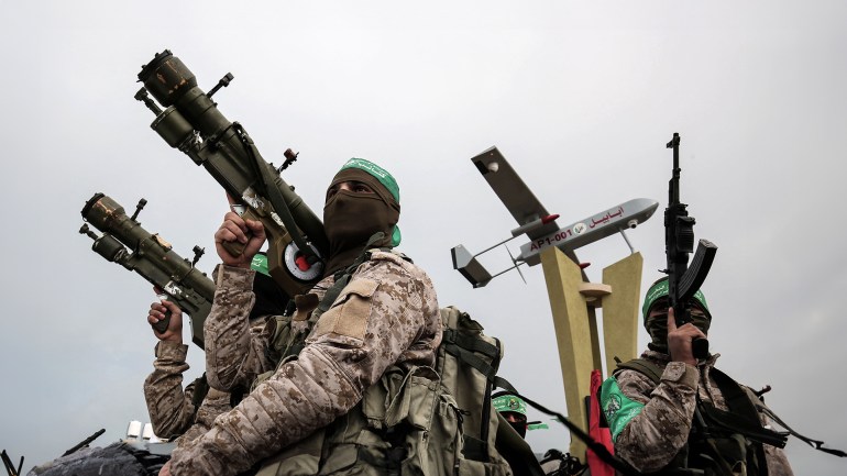 Members of the Ezzedine al-Qassam Brigades, the military wing of the Palestinian Islamist movement Hamas, attend a memorial in the southern Gaza Strip town of Rafah (File Photo: Said Khatib/AFP)