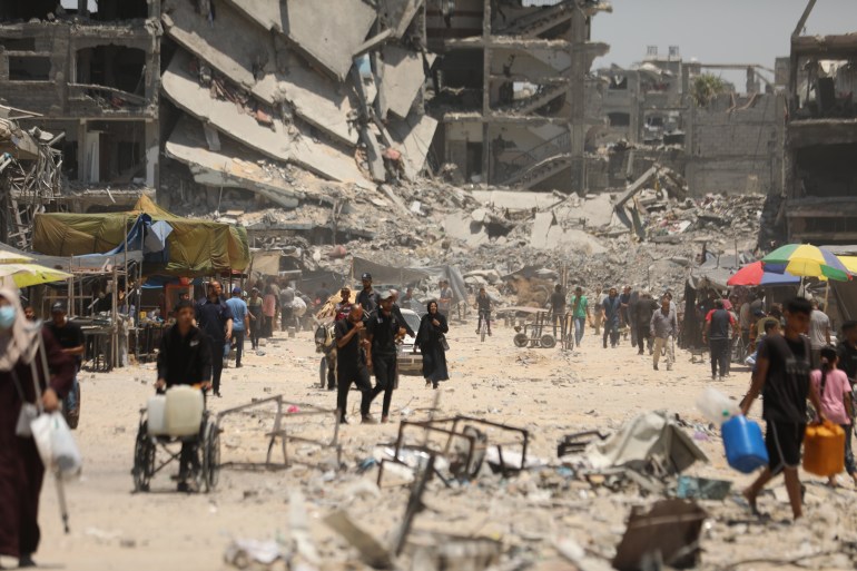 JABALIA, GAZA - JUNE 7: Palestinians, whose houses were destroyed in the attacks on the Jabalia Refugee Camp, try to continue their lives under difficult conditions among the rubbles as the Israeli attacks continue on Jabalia, Gaza on June 7, 2024. The Israeli army left great destruction in the area as a result of a 20-day ground operation before withdrawing from the camp on May 31. (Photo by Dawoud Abo Alkas/Anadolu via Getty Images)