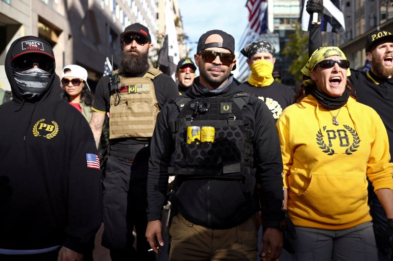 FILE PHOTO: Members of the far-right Proud Boys, including leader Enrique Tarrio, rally in support of U.S. President Donald Trump to protest against the results of the 2020 U.S. presidential election, in Washington, U.S. November 14, 2020. REUTERS/Hannah McKay/File Photo