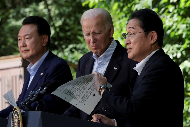 U.S. President Joe Biden holds a joint press conference with Japanese Prime Minister Fumio Kishida and South Korean President Yoon Suk Yeol during the trilateral summit at Camp David near Thurmont, Maryland, U.S., August 18, 2023. REUTERS/Jim Bourg