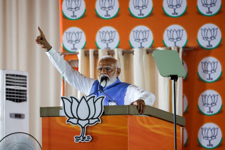 FILE PHOTO: India's Prime Minister Narendra Modi gestures as he addresses supporters during an election campaign rally, in New Delhi, India, May 22, 2024. REUTERS/Adnan Abidi/File Photo