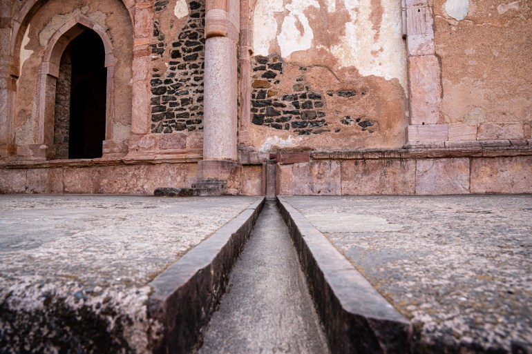 a medieval era drainage duct ditch channel cut into the floor of an indian palace name after baz bahadur شترستوك