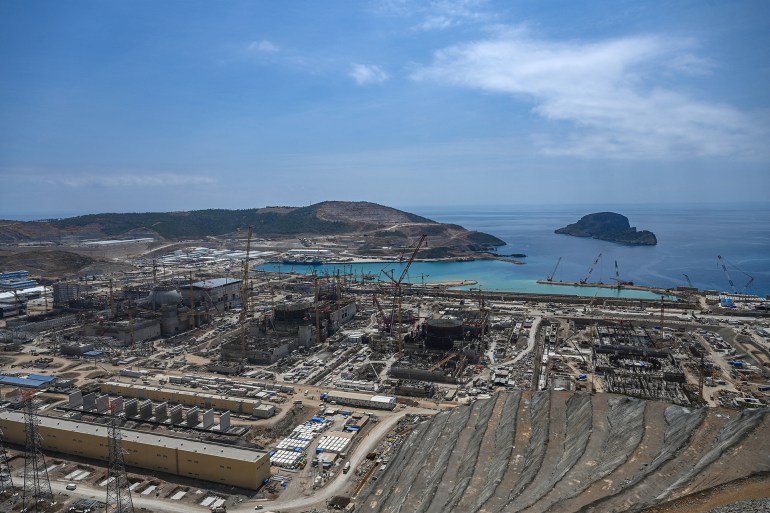 This aerial photograph taken on April 26, 2023 shows the construction of the Russian-built Akkuyu Nuclear Power Plant in Mersin Province. Turkey's President Recep Tayyip Erdogan will try to offset his absence from the campaign trail weeks before crucial elections by unveiling the nuclear plant by video link. (Photo by OZAN KOSE / AFP)