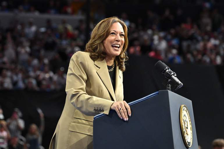 TOPSHOT - US Vice President and Democratic presidential candidate Kamala Harris speaks during a campaign event at Desert Diamond Arena in Glendale, Arizona, on August 9, 2024. (Photo by Robyn Beck / AFP)