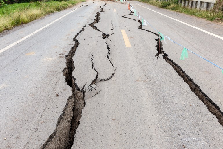 Asphalt road cracked and broken from earthquake.; Shutterstock ID 305483720; Department: -