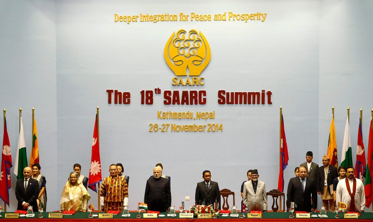 (Front L-R) Afghanistan's President Ashraf Ghani, Bangladesh's Prime Minister Sheikh Hasina, Bhutan's Prime Minister Tshering Tobgay, India's Prime Minister Narendra Modi, Maldives' President Abdulla Yameen, Nepal's Prime Minister Sushil Koirala, Pakistan's Prime Minister Nawaz Sharif and Sri Lanka's President Mahinda Rajapaksa attend the opening session of 18th South Asian Association for Regional Cooperation (SAARC) summit in Kathmandu November 26, 2014. South Asian leaders from Afghanistan to the Maldives met in Kathmandu on Wednesday for a summit that was undermined by traditional bickering between rivals Pakistan and India. REUTERS/Narendra Shrestha/Pool (NEPAL - Tags: POLITICS)