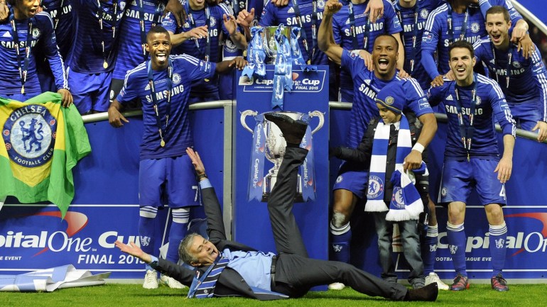 epa05072893 (FILES) A file picture dated 01 March 2015 shows Chelsea manager Jose Mourinho (C) celebrating with his team after their 2-0 win over Tottenham during the Capital One cup final at Wembley in London, Britain. Chelsea manager Mourinho has been sacked on 17 December 2015. EPA/GERRY PENNY EDITORIAL USE ONLY. No use with unauthorized audio, video, data, fixture lists, club/league logos or 'live' services. Online in-match use limited to 75 images, no video emula