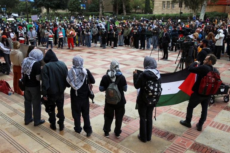 Demonstrators attend a protest at the University of California Los Angeles (UCLA), following the arrest by U.S. immigration agents of Palestinian student protester Mahmoud Khalil, in Los Angeles, California, U.S. March 11, 2025. REUTERS/Daniel Cole