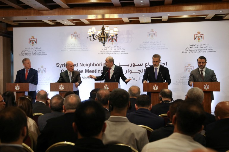 Lebanese Foreign Minister Youssef Rajji, Turkish Foreign Minister Hakan Fidan, Iraqi Foreign Minister Fuad Hussein, Syrian Foreign Minister Asaad Hassan al-Shibani and Jordanian Foreign Minister Ayman Safadi attend a press conference after a meeting of delegations from Turkey, Jordan, Syria, Lebanon and Iraq, in Amman, Jordan, March 9, 2025. REUTERS/Alaa Al Sukhni