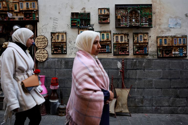 People walk at a traditional souq in the Bab Touma district of the Old City of Damascus, after the ousting of Syria's Bashar al-Assad, in Damascus, Syria, December 22, 2024. REUTERS/Ammar Awad