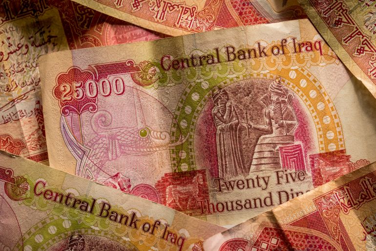 Iraqi 25000 dinar banknotes issued by the Central Bank of Iraq. Photographer: Jason Alden/Bloomberg