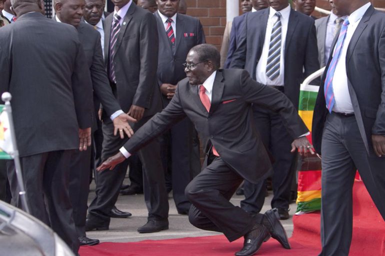President Robert Mugabe falls