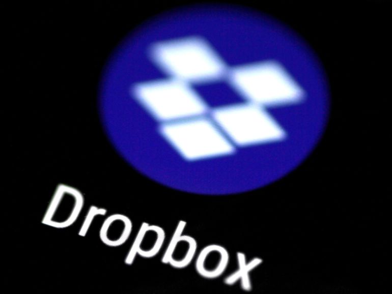 The Dropbox app logo seen on a mobile phone in this illustration photo October 16, 2017. REUTERS/Thomas White/Illustration