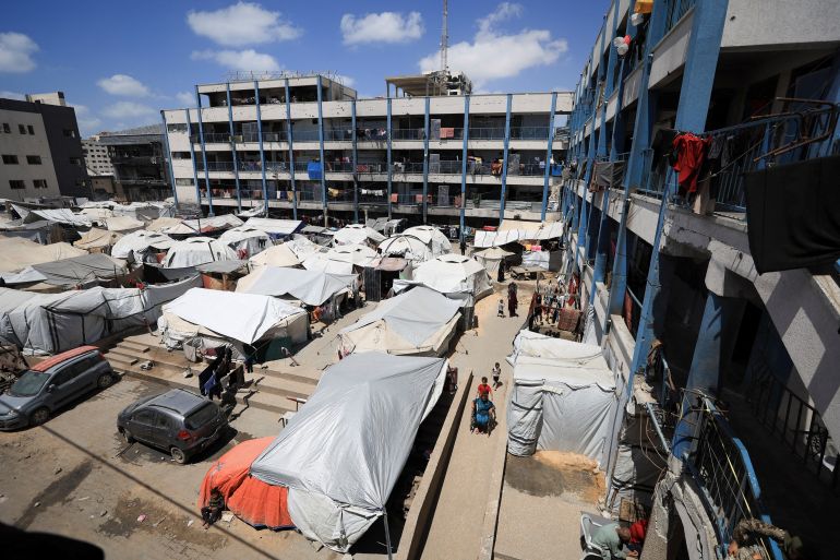 Palestinians displaced by the Israeli military offensive shelter in tents in a UNRWA school, in Gaza City May 28, 2025. REUTERS/Dawoud Abu Alkas