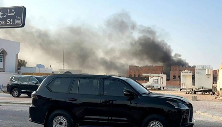 TOPSHOT - This frame grab taken from an AFPTV footage shows smoke billowing after explosions in Qatar's capital Doha on September 9, 2025.