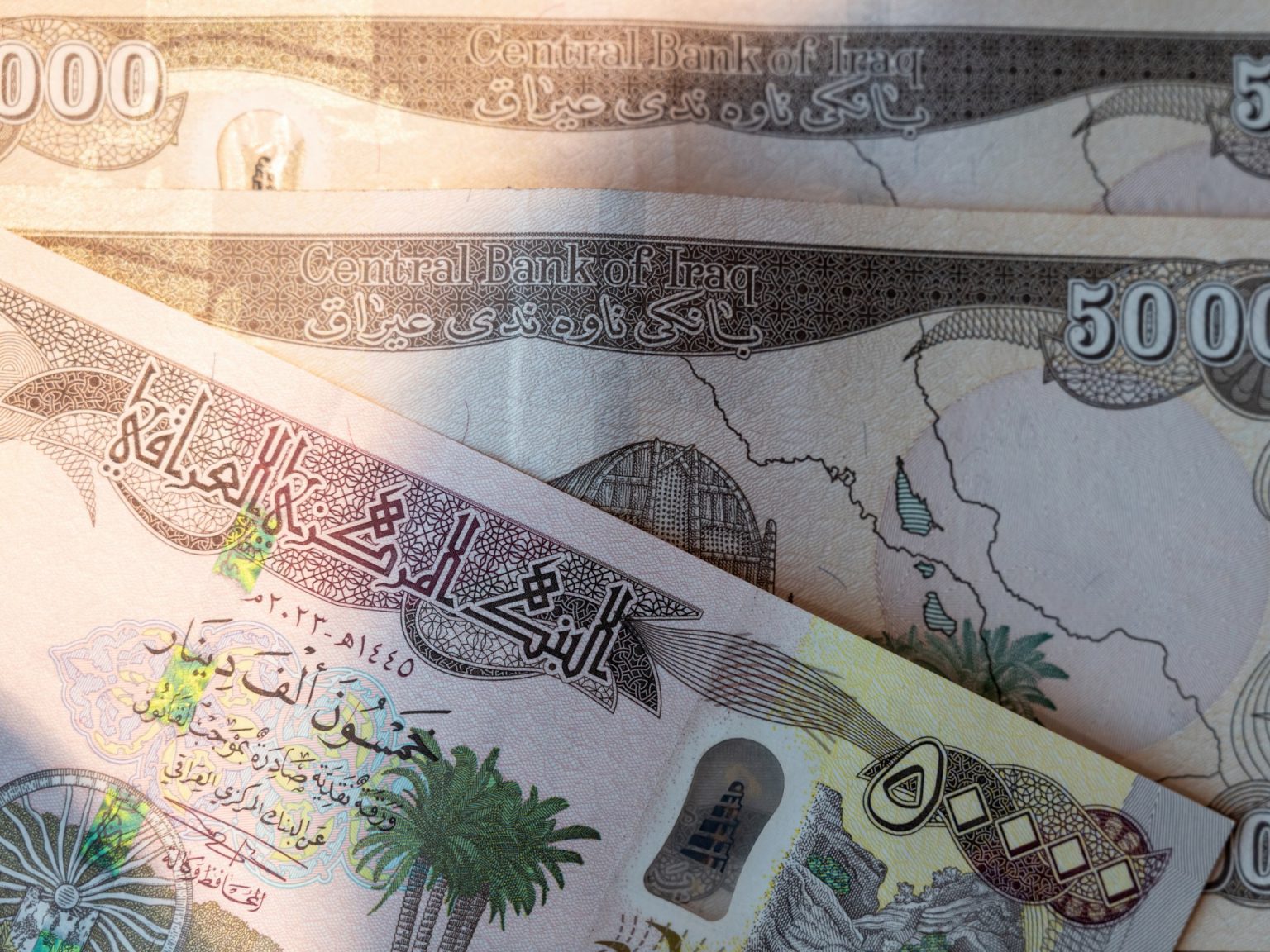 حذف الأصفار من الدينار العراقي تداعياته على الاقتصاد وأسواق المال